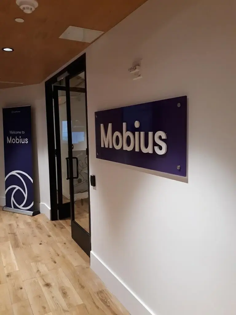 Mobius Custom Acrylic Blue Lobby Signs for Entrance in NYC