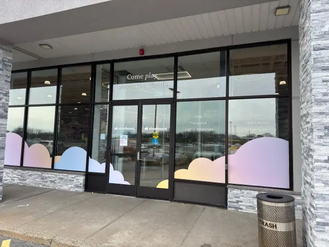 First-surface cut vinyl window graphics and lettering for EM Limited Cloudbound, New Rochelle, NY.