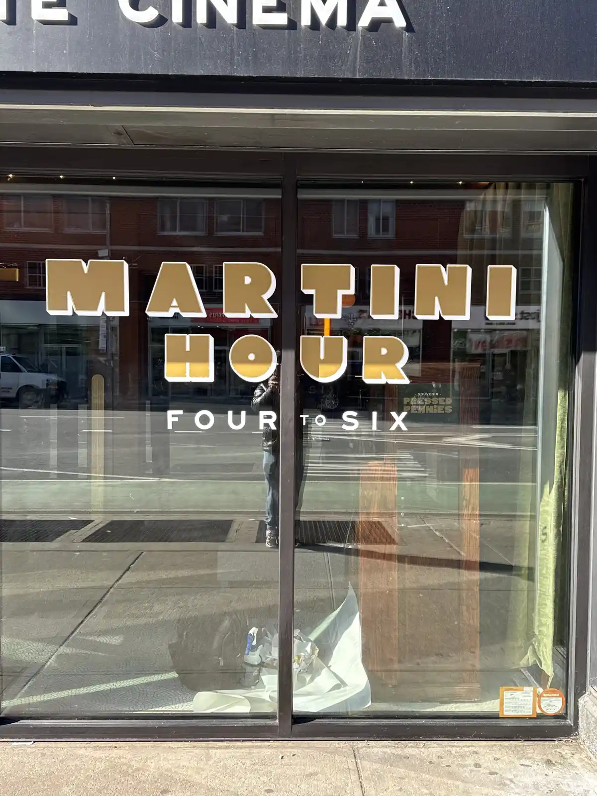 Exterior first-surface layered film window lettering for Metro Private Cinema, Manhattan, NY.