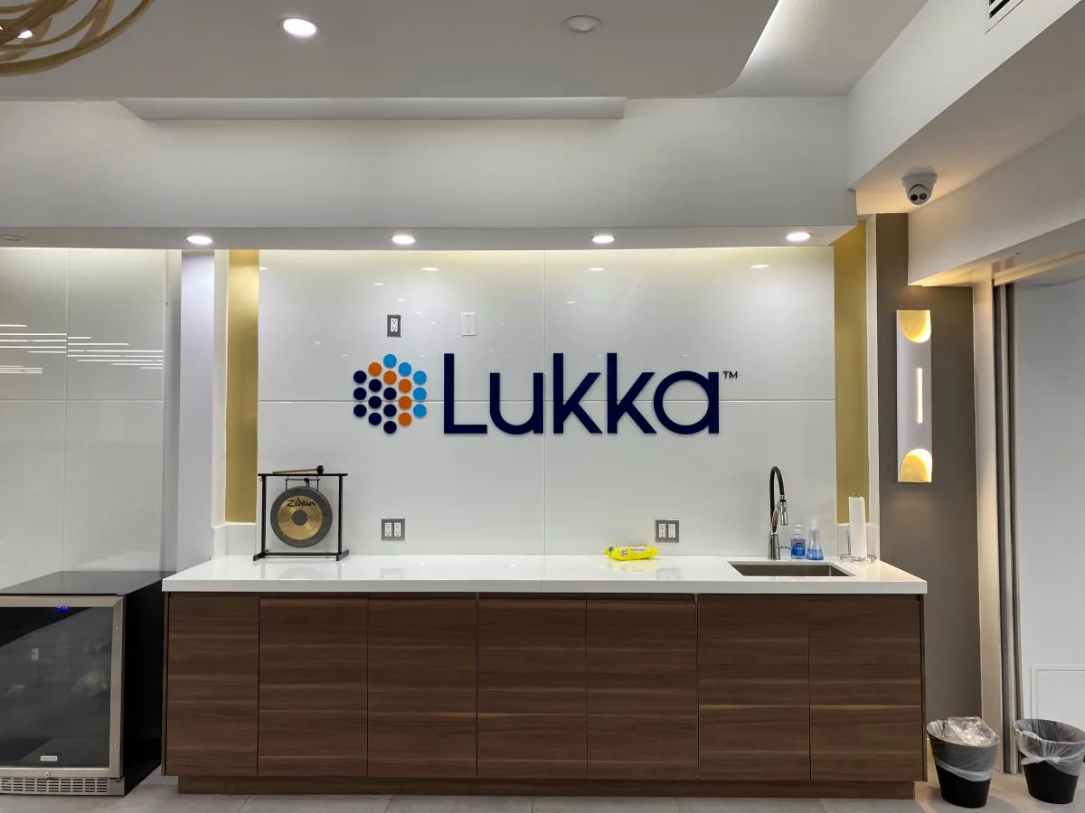 Lukka Global reception lettering